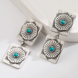 Vintage western turquoise earrings with retro silver layered square and sunburst patterns
