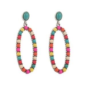 Detail of bohemian silver oval earrings with turquoise studs and multicolored beads