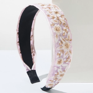 Bohemian wide headband with delicate floral embroidery on light pink purple fabric base