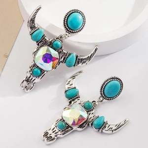 Détails de boucles d'oreilles bohème tête de vache avec turquoise et cristal irisé