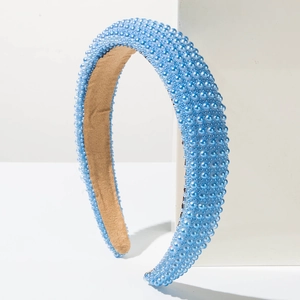 Sky blue padded headband with shiny pearls and anti-slip lining for elegant women styling