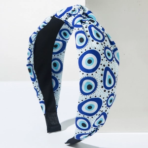 Blue and white Evil Eye printed knotted headband with wide fabric and non-slip lining