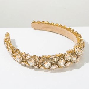 Detail view of Baroque headband with sparkling champagne crystals and gold metal setting