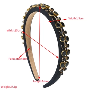 Luxurious black sponge headband with sparkling black crystals and golden metal settings