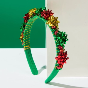 Sparkly Christmas headband with festive red and green gift box bows and golden bells