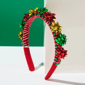 Detail of Christmas headband featuring red, green and gold metallic bows and small beads