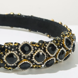 Macro shot of Baroque luxury headband with black gems and sparkling rhinestones