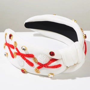 Hand-beaded headband with red and gold sequins and crystals in a padded knot design