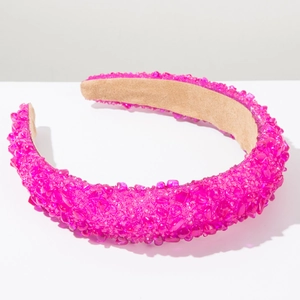 Detailed macro view of pink crystal beaded baroque wide sponge headband with plush lining