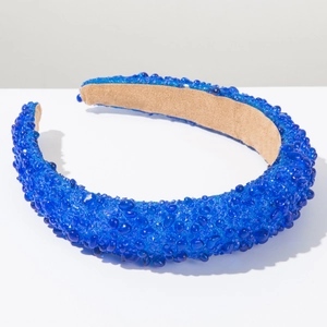 Macro shot of blue crystal beads on sponge headband with soft non-slip velvet lining