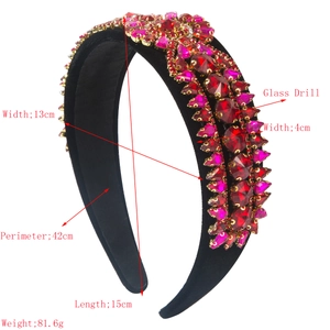 Baroque style wide headband with red glass crystals and size details on white backdrop