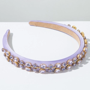 Detail view of purple satin headband featuring two rows of sparkling lavender crystals