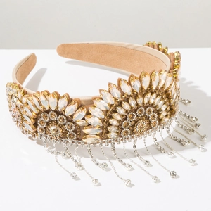 Detailed macro view of baroque crown headband with luxury rhinestones and crystal tassels
