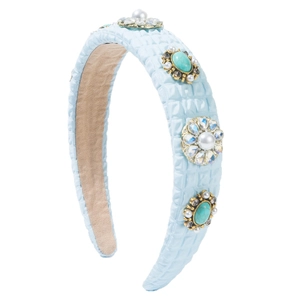 Light blue quilted headband with turquoise gems, pearls and crystal floral cluster