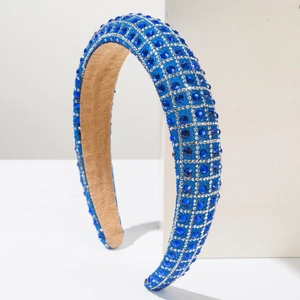 Sparkling royal blue rhinestone headband with wide padded design for luxury parties