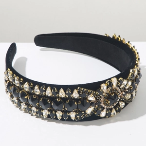 Detailed close-up of Baroque style wide headband with black velvet and sparkling rhinestones
