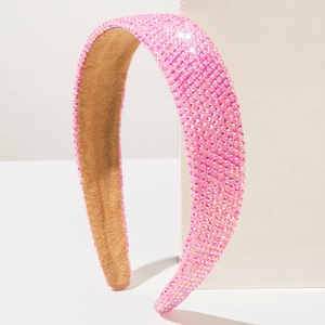 Serre-tête rose scintillant orné de strass avec intérieur rembourré sur support