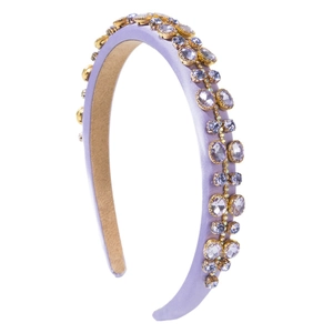 Chic lilac padded headband with purple crystals and gold settings for a stylish look