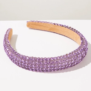 Detail of purple rhinestone padded headband with premium velvet inner lining