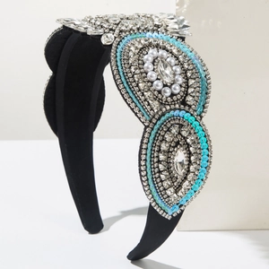 Luxury Baroque headband with black velvet base featuring crystals, pearls and blue sequins