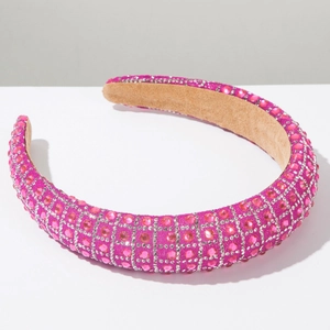 Detail of pink rhinestone padded headband with sparkling silver grid pattern