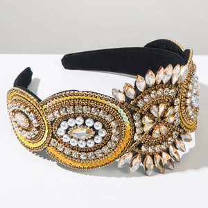 Macro shot of Baroque headband featuring champagne rhinestones and white pearls