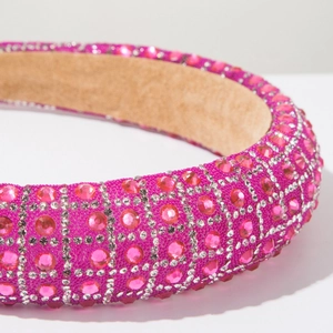Close-up of luxury rose pink rhinestone padded headband with crystal lattice design