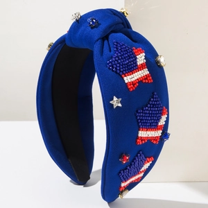 Dettaglio fascia blu con nodo, stelle di perline USA e strass ricamati a mano