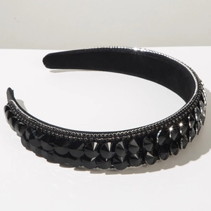 Detail of luxury baroque headband featuring black faceted crystals and silver rhinestone trim
