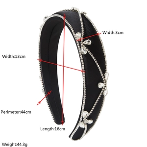 Detail view of black padded headband with crystal rhinestones and size specifications
