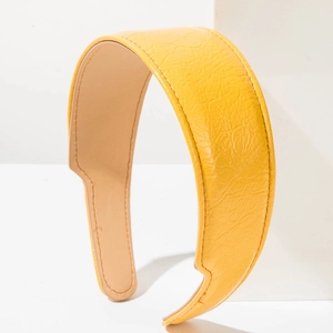 Serre-tête large en cuir jaune vif avec texture de litchi et surpiqûres élégantes