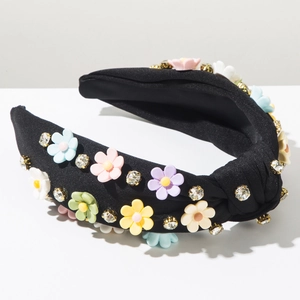 Detail of black wide headband with colorful 3D flowers and sparkling crystal rhinestones