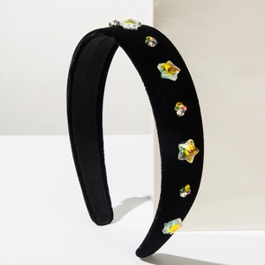 Detailed close-up of Baroque velvet headband with colorful rhinestones and crystals