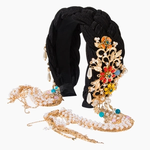 Ethno-Handgeflochtenes Stirnband mit goldenen Blumen und langen Perlen-Quasten