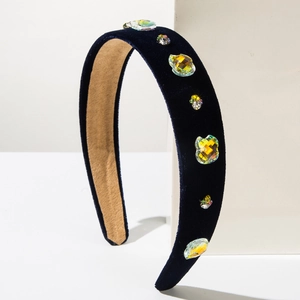 Close-up of blue velvet headband featuring colorful crystal diamonds and non-slip lining