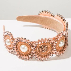 Detailed view of pink Baroque headband featuring hand-beaded rhinestones and pearls