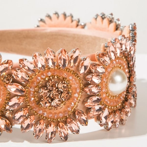 Detailed macro view of baroque headband with marquise rhinestones and pearls