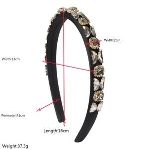 Detail showing dimensions of vintage black sponge headband with crystal butterfly pattern