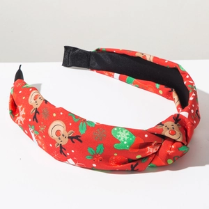 Detail van rode kerst hoofdband met rendierprint en antislip zwarte stoffen voering