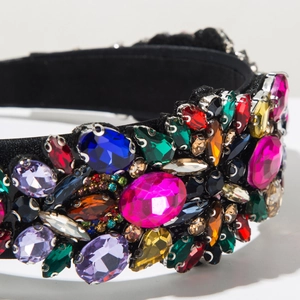 Macro side view of baroque wide headband with colorful crystals and black velvet texture