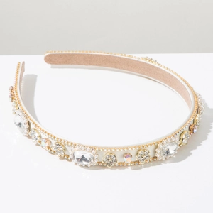 Close-up of luxury Baroque headband with crystal rhinestones and metal flowers