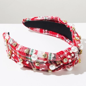 Macro shot of plaid festive headband with faux pearls and sparkling crystal details