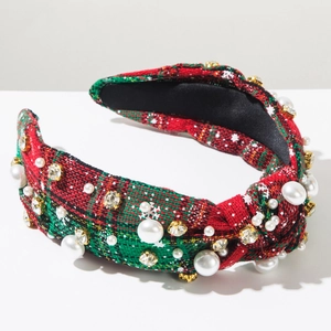 Detailed view of Christmas wide knotted headband with red green plaid and pearls