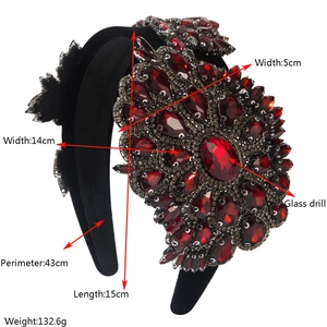 Detail of Baroque velvet headband with large red crystals and glass drill ornaments