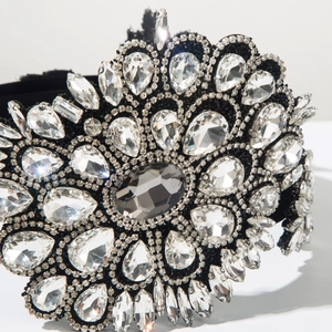 Macro detail of Baroque floral headband featuring grey crystal and silver rhinestones