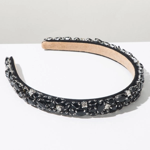 Vue détaillée du serre-tête baroque noir orné de strass avec intérieur en velours