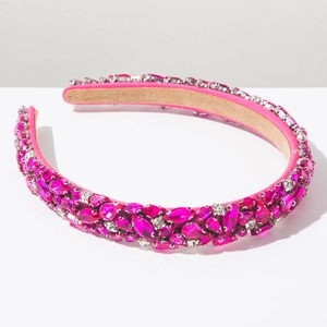 Vue détaillée du serre-tête fuchsia avec cristaux marquise pour soirées de luxe
