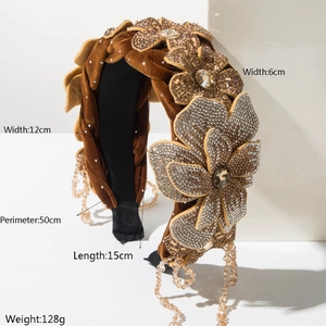 Detailed view of velvet headband with crystal flowers and hanging tassel fringe