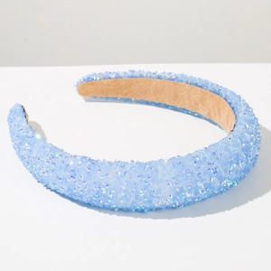 Close-up of sparkling light blue beaded wide headband with soft velvet inner lining