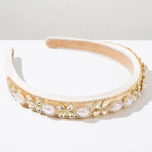 Detailed macro view of baroque headband with crystals and golden flower accents